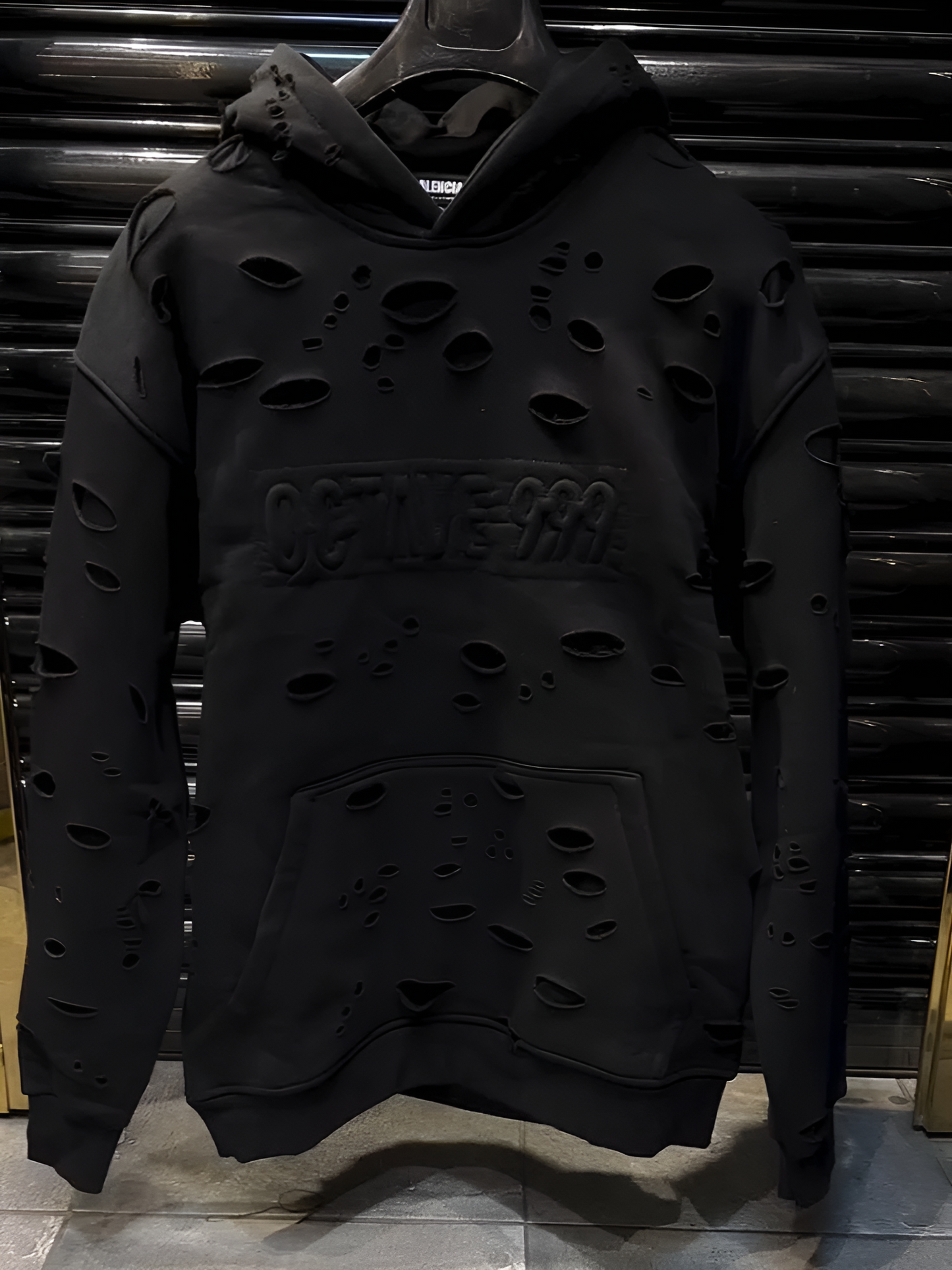 Washed hooded ripped sweatshirt